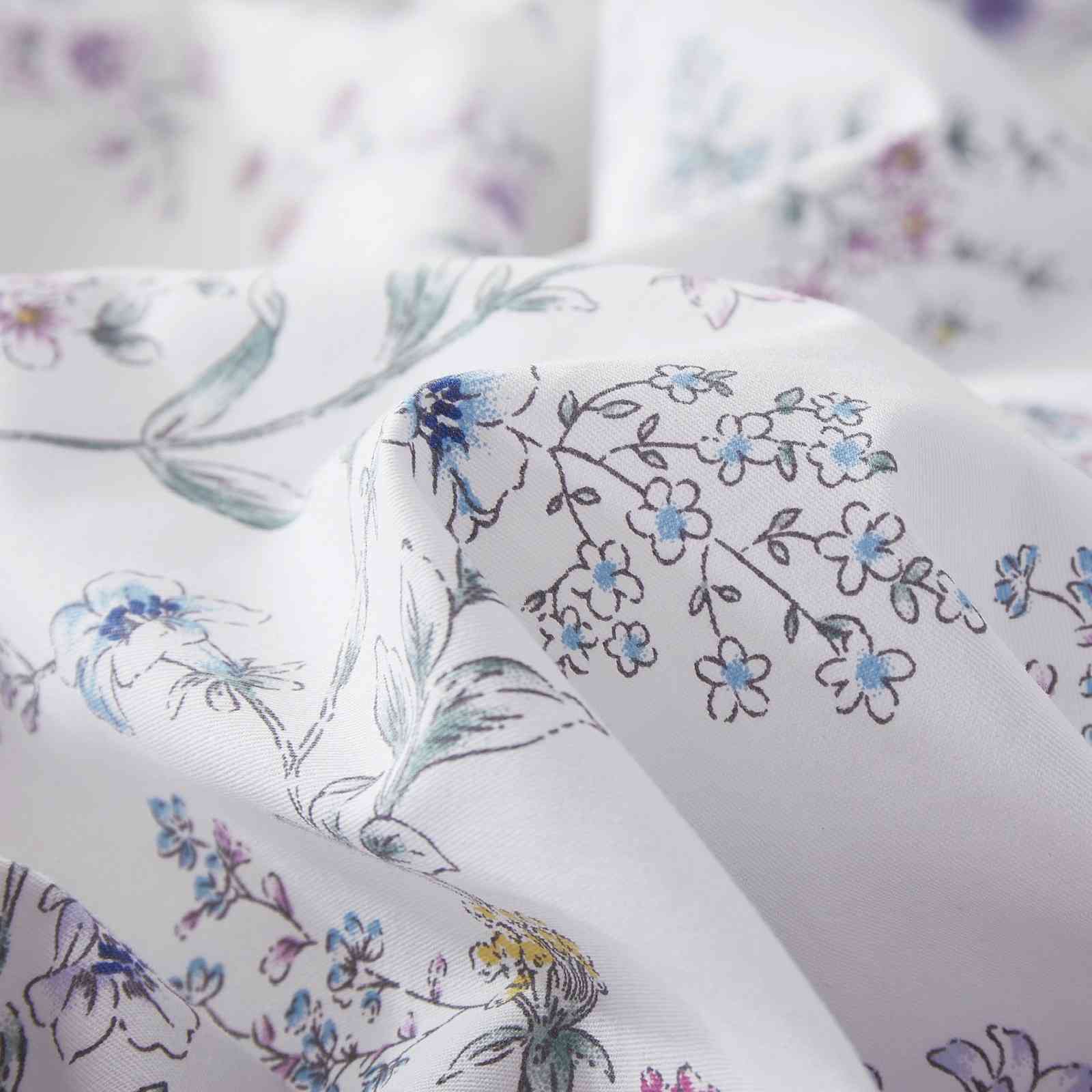 Emma floral pattern detail on natural cotton duvet cover