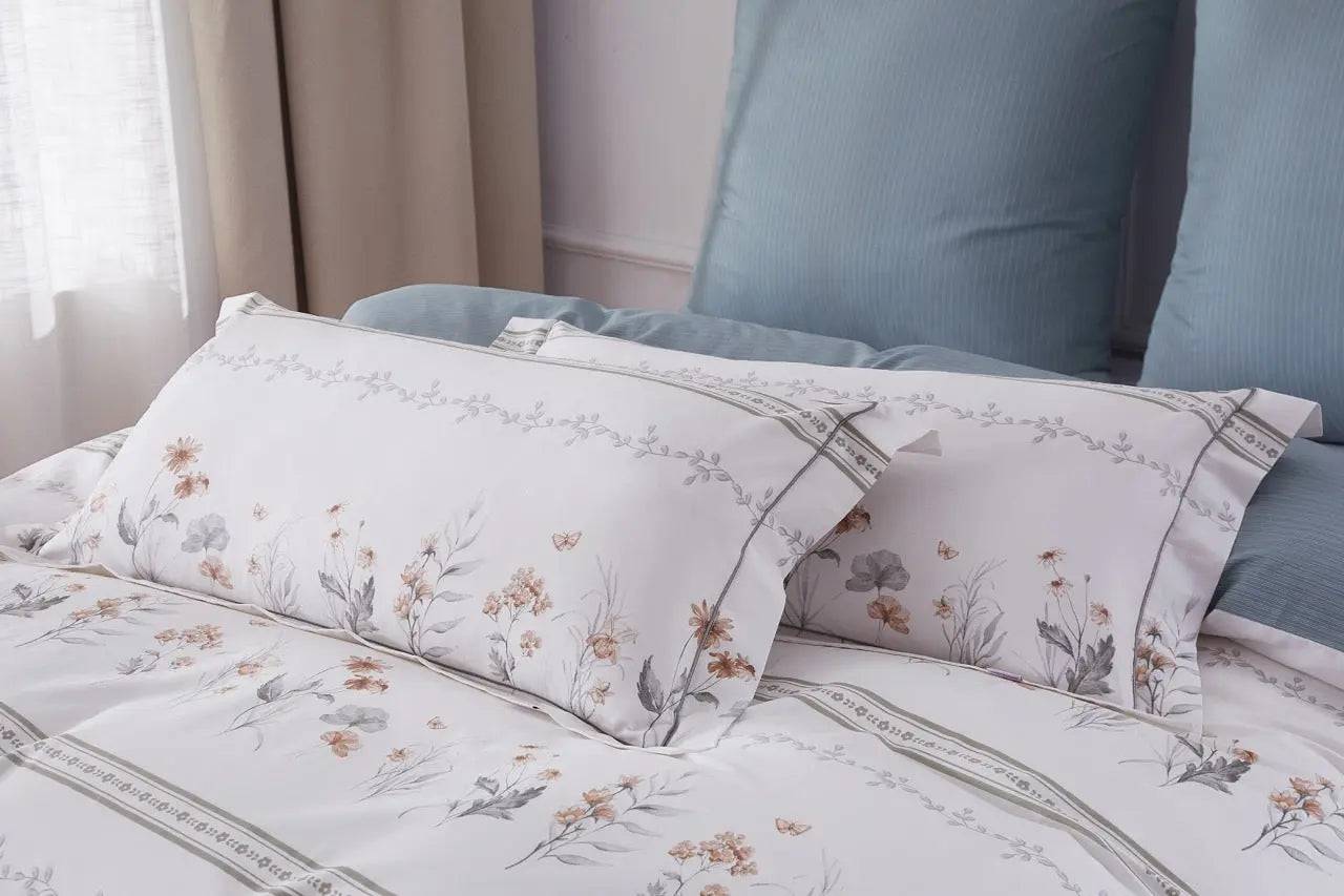 Hamburg OEKO-TEX cotton bedding in cozy bedroom interior